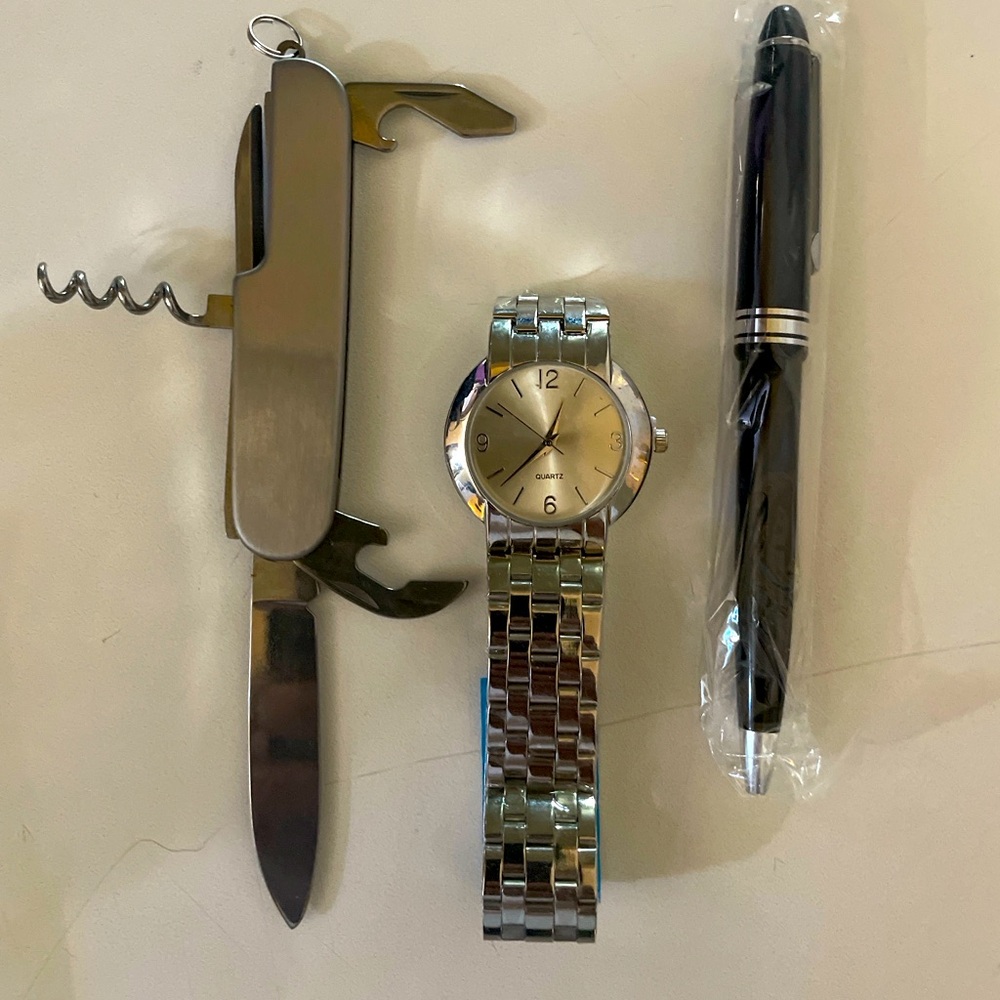Quartz watch, pen and multi-tool set.